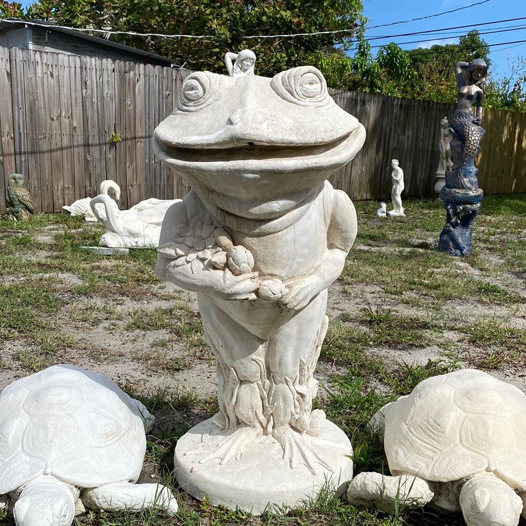 concrete frog statue