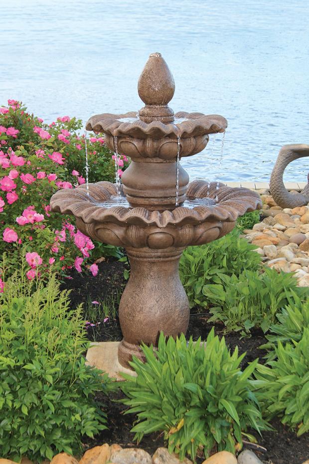 A tiered stone fountain from Massarelli's. Water flows from the upper level and falls gracefully in the 2-Tier fountain base.
