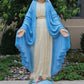 Detailed cast stone statue of Virgin Mary standing on a base outdoors | CBSD