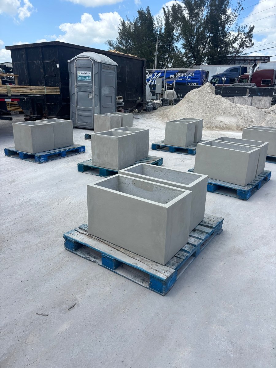 Outdoor concrete rectangular planter used for plants and greenery in outdoor commercial and residential environments