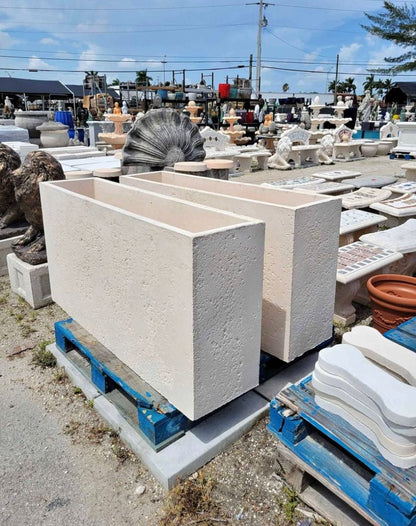 Rectangular cast concrete outdoor planter showing clean modern design for patios, courtyards, and property landscapes